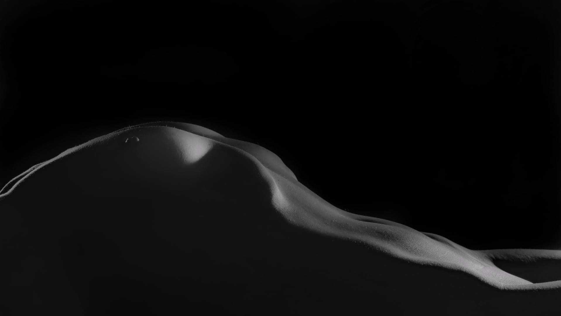 Black and white artistic portrait of Nikki Muse