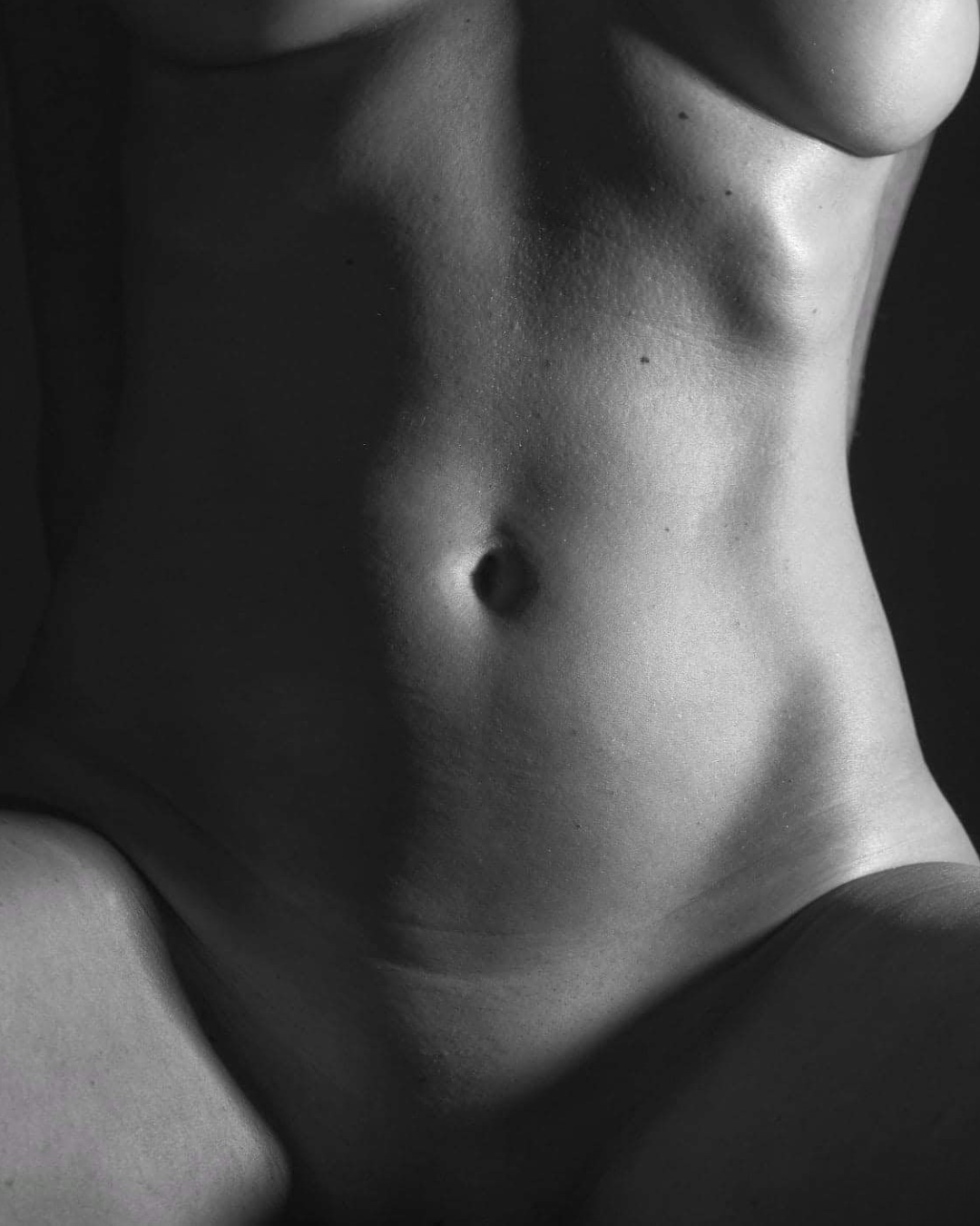 Black and white artistic portrait of Nikki Muse